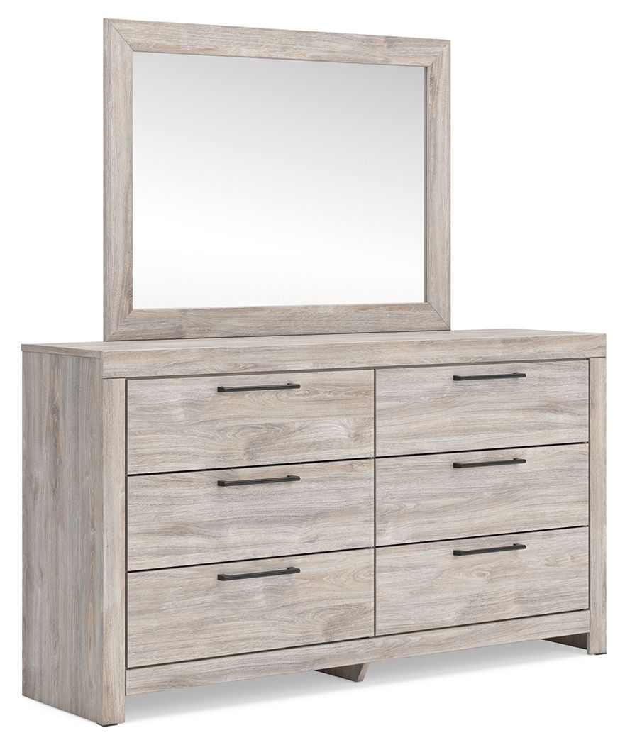 Six-drawer dresser with framed mirror and light wood drawer fronts with metal bar pulls.