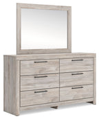 Light gray dresser with wall mirror and six drawers, dark metal bar pulls
