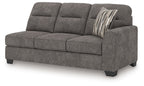 Graphite gray fabric sofa with three back cushions and striped throw pillow