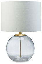 Glass table lamp with white fabric shade and clear glass globe base with brass stem
