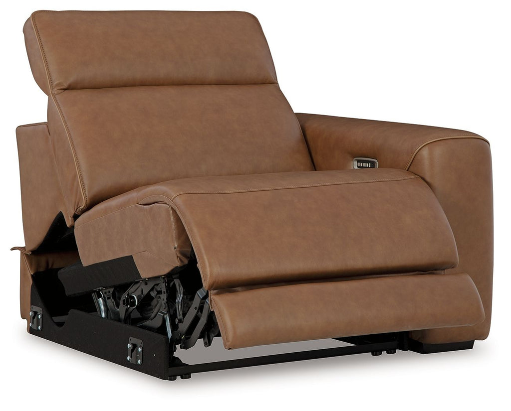 Caramel power recliner shown in reclined position with control panel on arm