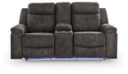 Charcoal double reclining loveseat, front view with reclining seats and console