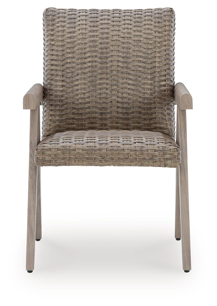 Beige woven arm chair with light wood armrests and woven seat