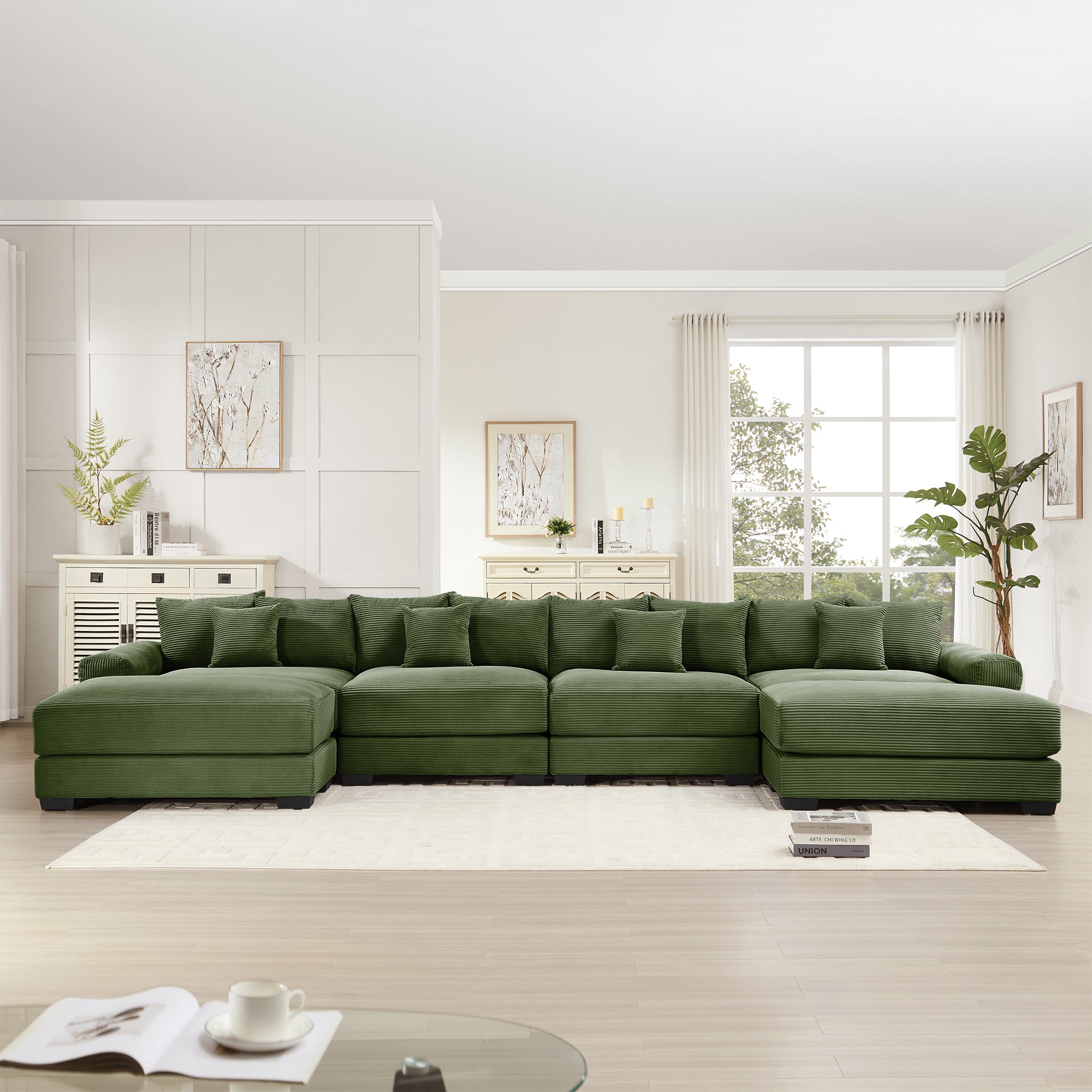 Green corduroy sectional sofa with L-shaped chaise and deep seat cushions