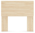 Light wood panel headboard with wide top panel and drilled side posts.
