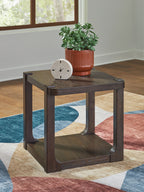 Dark brown two-tier table with open lower shelf; decor items on top