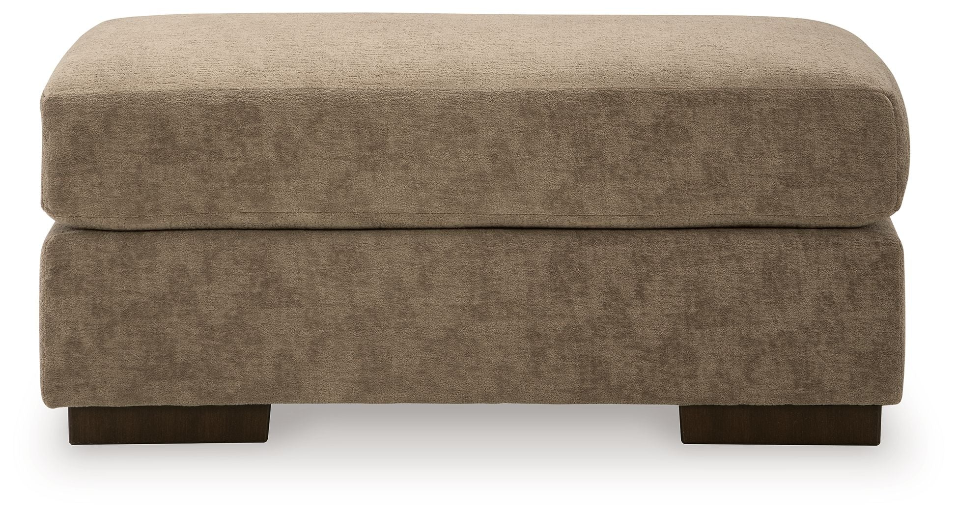 Dark brown fabric ottoman with padded top and dark wooden legs.