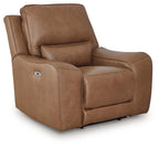 Caramel power recliner chair with padded headrest and armrests, power switch on side