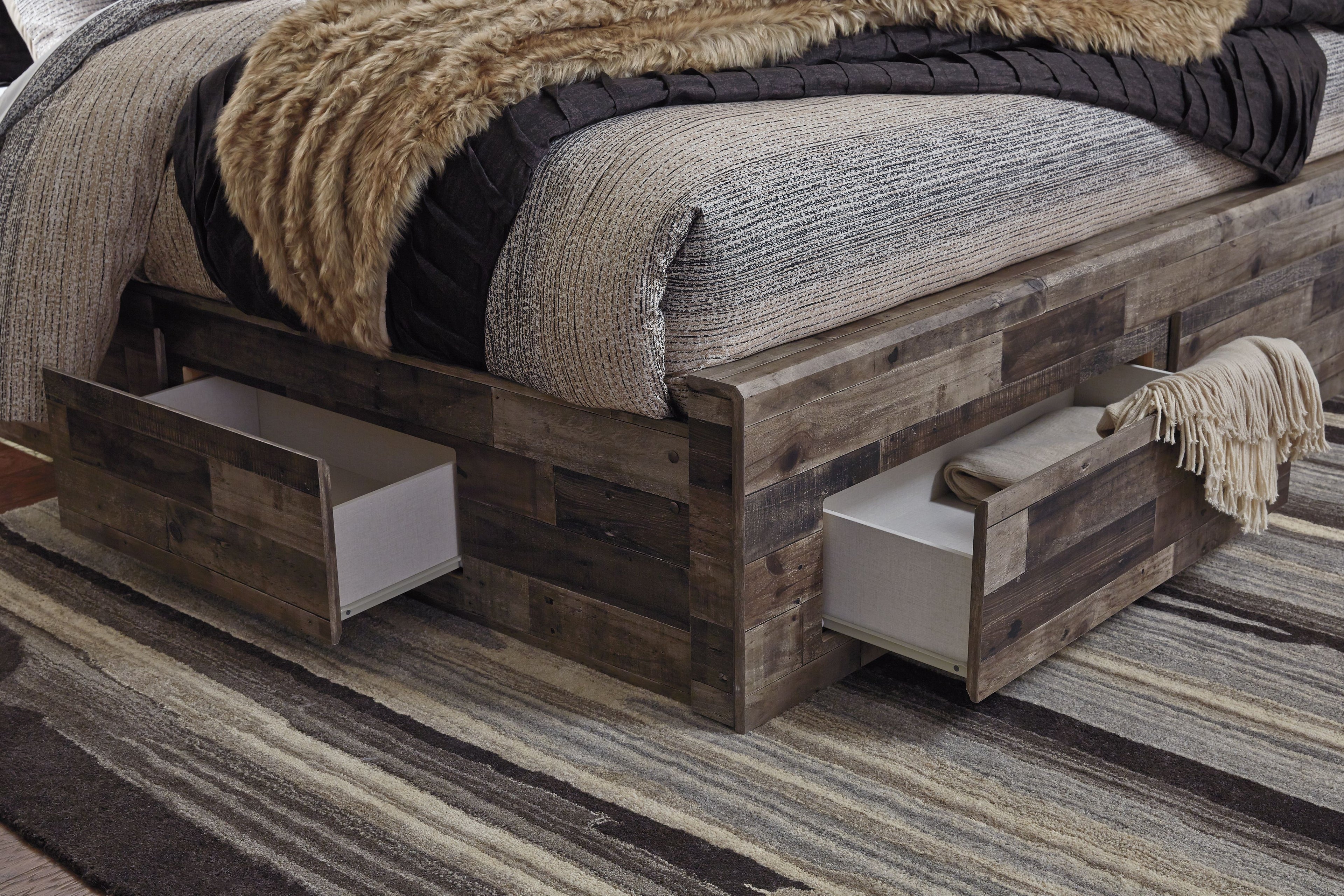 Rustic wood panel bed with open side storage drawers and cushioned headboard