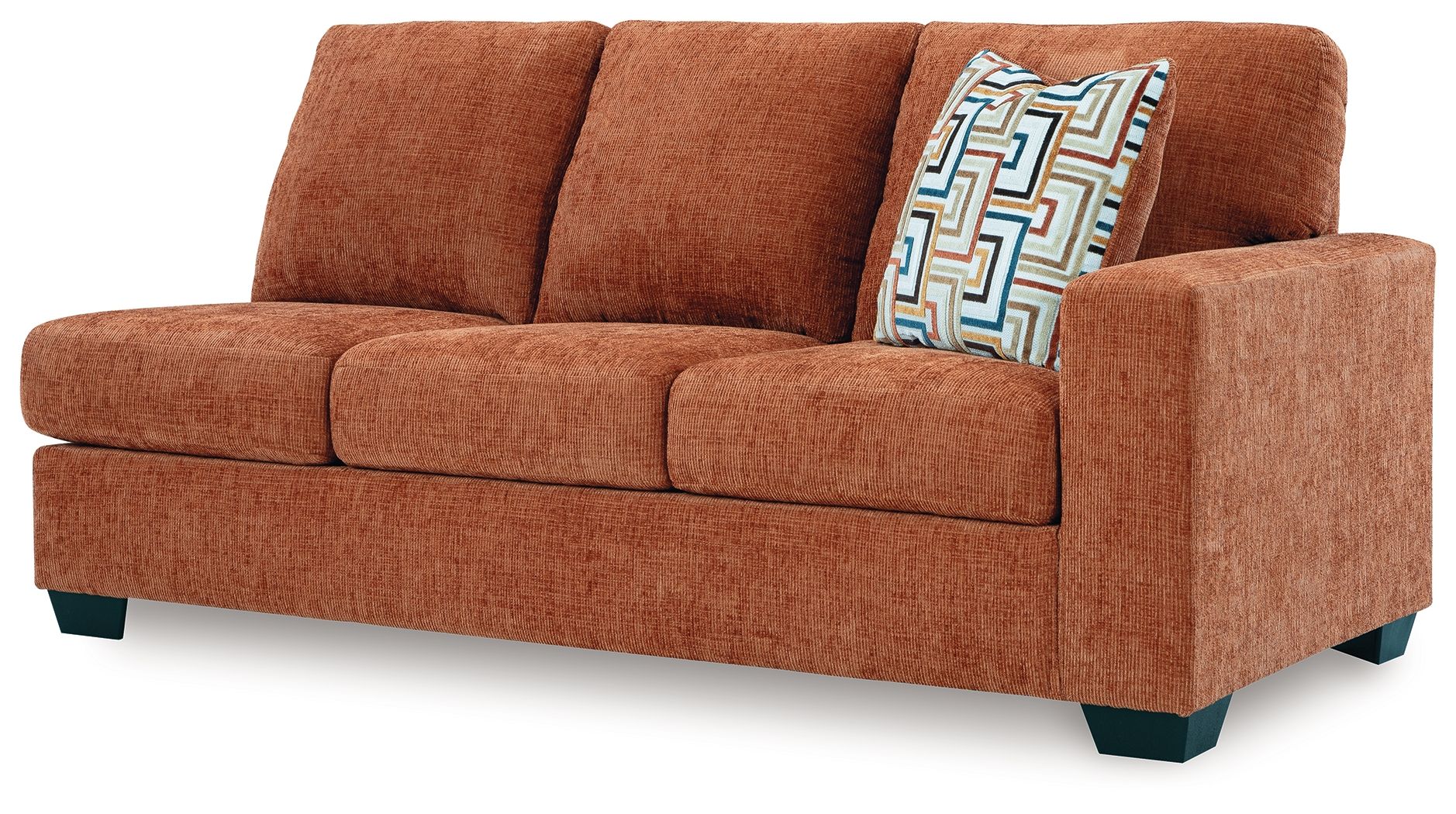 Rust orange RAF sofa side view with armrest and patterned cushion