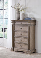 Five-drawer chest, light grayish-brown finish with metal knobs and bun feet