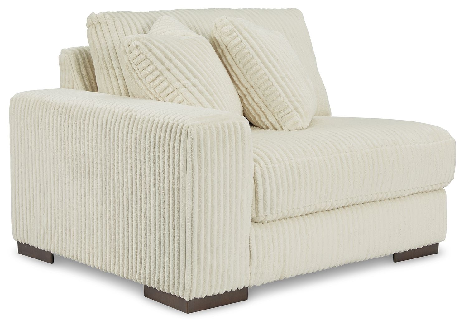 Ivory corner chair with upholstered arms and three back pillows