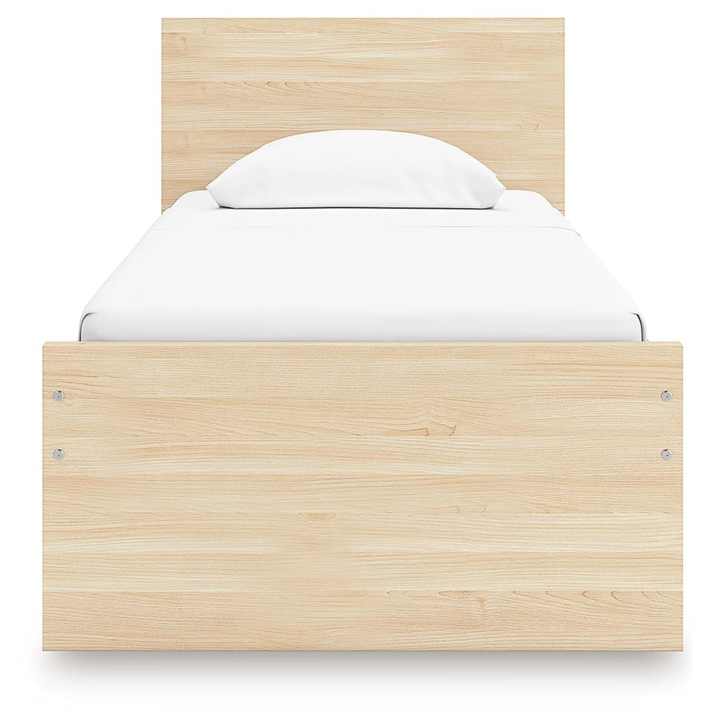 Light brown wood panel platform bed with solid front panel and arched headboard