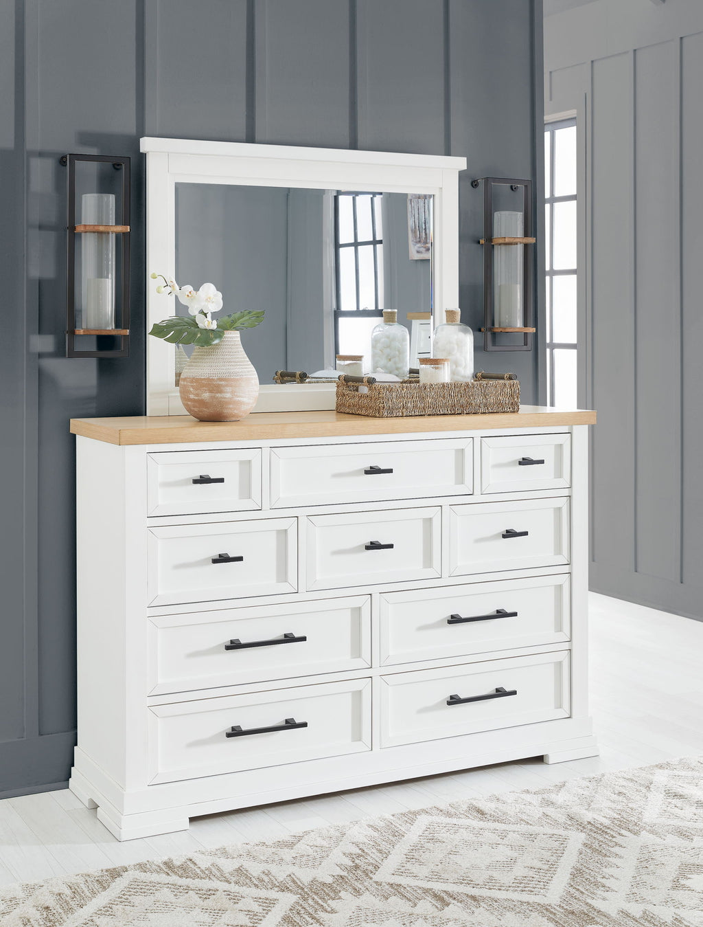 White panel storage dresser with eight drawers and dark wood countertop