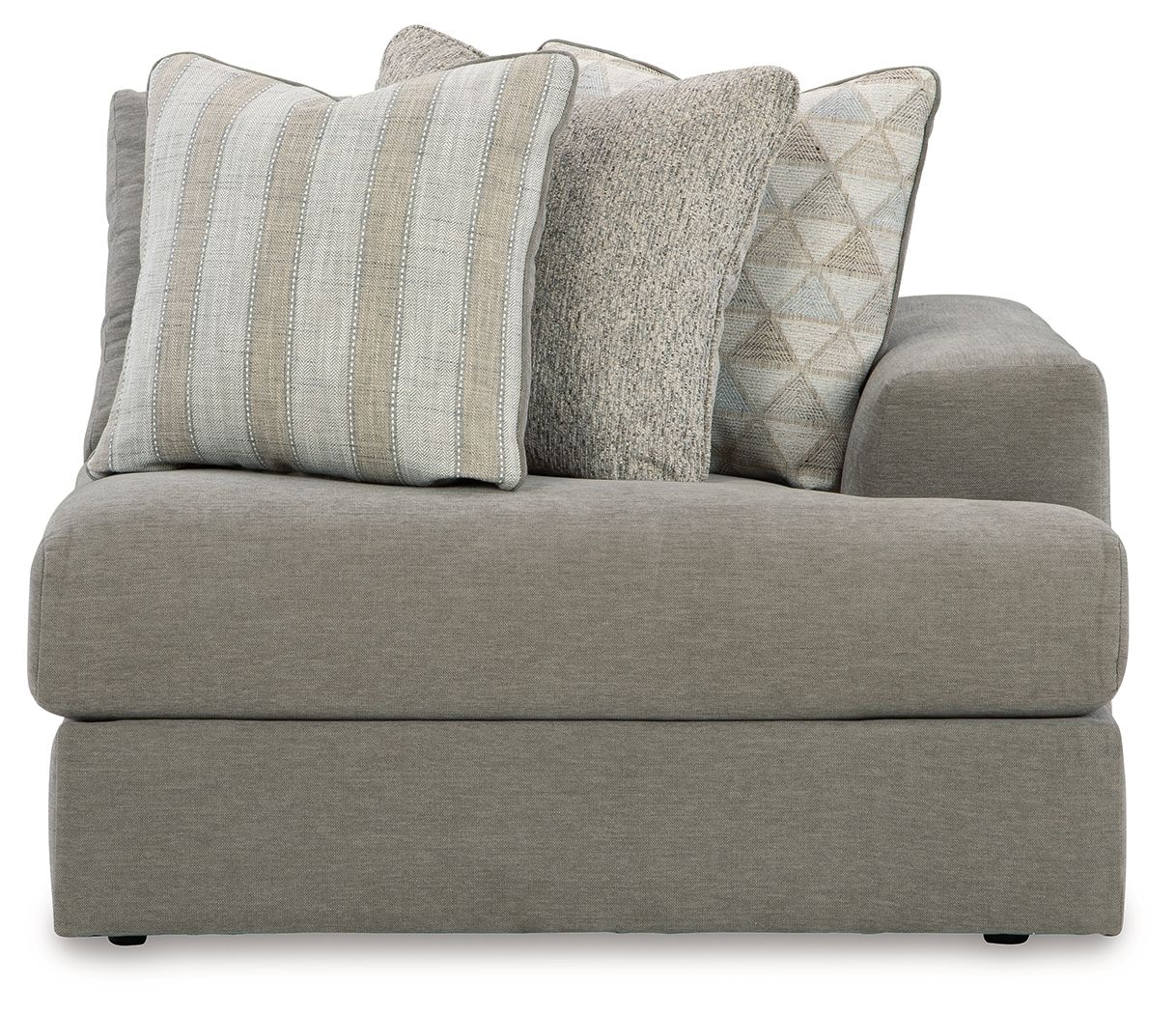 Ash gray corner chair with thick seat, armrests, and four decorative pillows