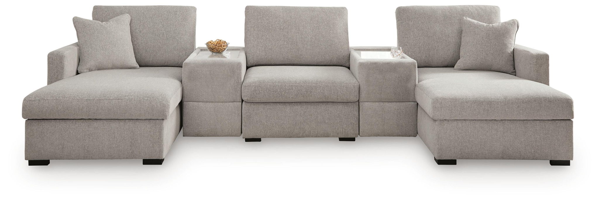 Gray sectional sofa featuring three-seat back panel and chaise ottomans at sides