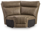 Brown sectional wedge with padded arms, tufted back cushions, and dark side storage panels