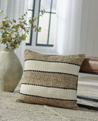Rueford pillow with light brown weave and black beaded horizontal stripe bands