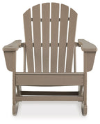 Light brown Adirondack rocking chair front view with slatted back and armrests.