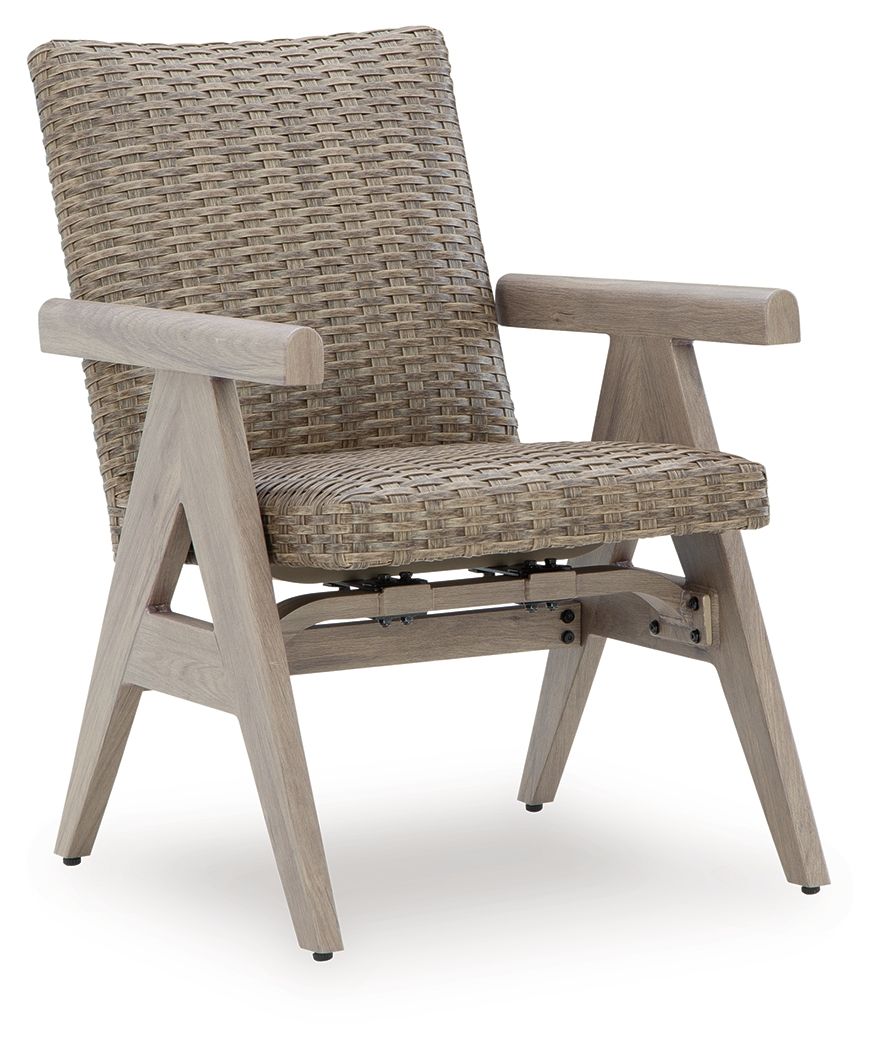 Rocking arm chair with woven beige upholstery, light wood arms and angled legs