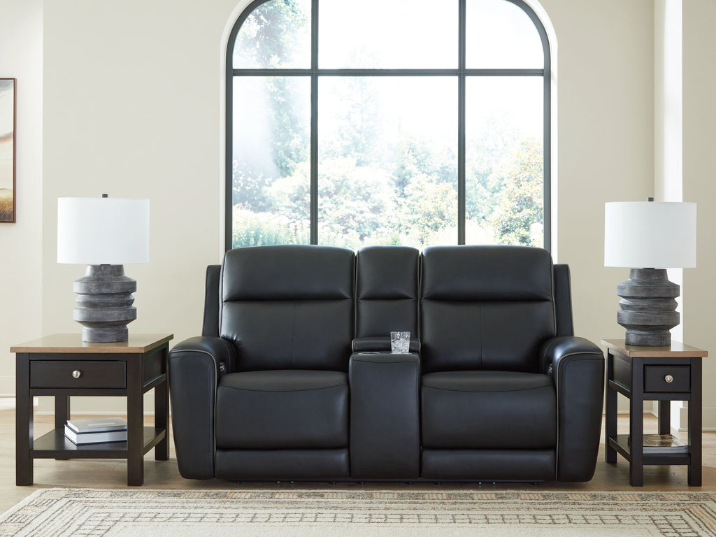 Black power reclining loveseat with console and adjustable headrest, centered front