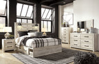 Bedroom furniture set with light wood bed, dresser with drawers, mirror, and nightstands