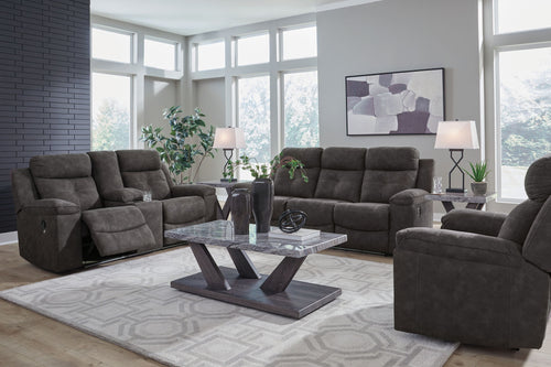 Dark gray reclining sofa and loveseat set with padded recline backs