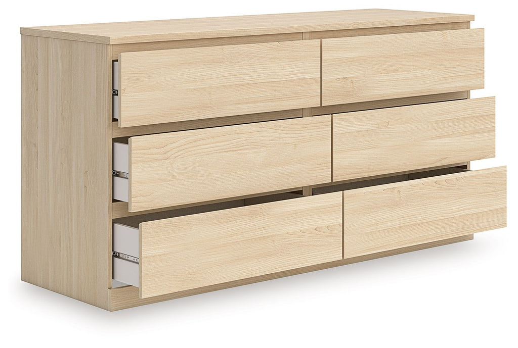 Light brown six-drawer dresser showing side drawer handles and metal runners