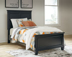Black panel bed with open front base and white-and-orange patterned bedding, paneled headboard