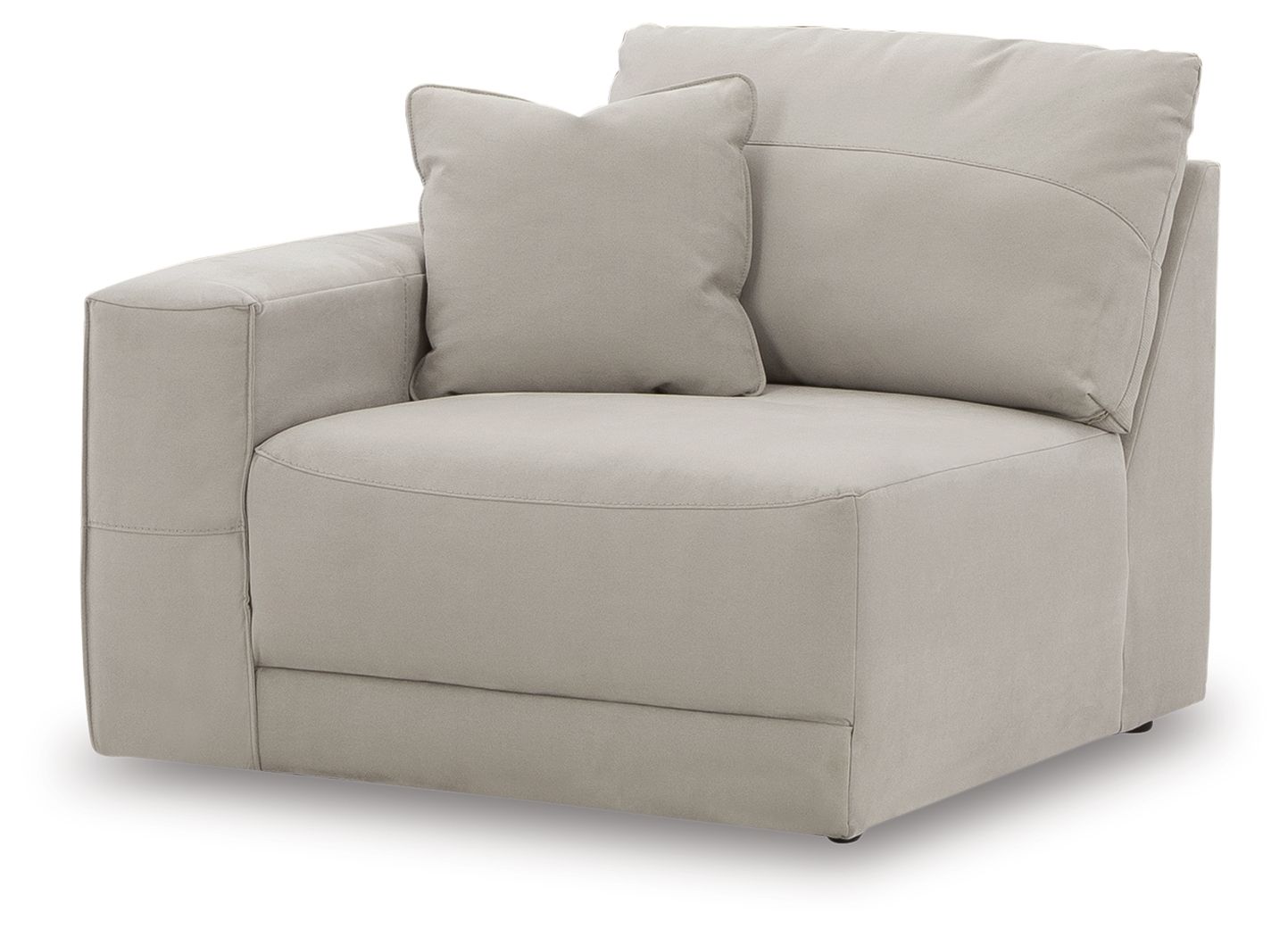Gray upholstered corner chair with back pillows, wide armrests, and squared arms