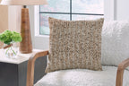Vorlane textured pillow on upholstered chair, light brown square