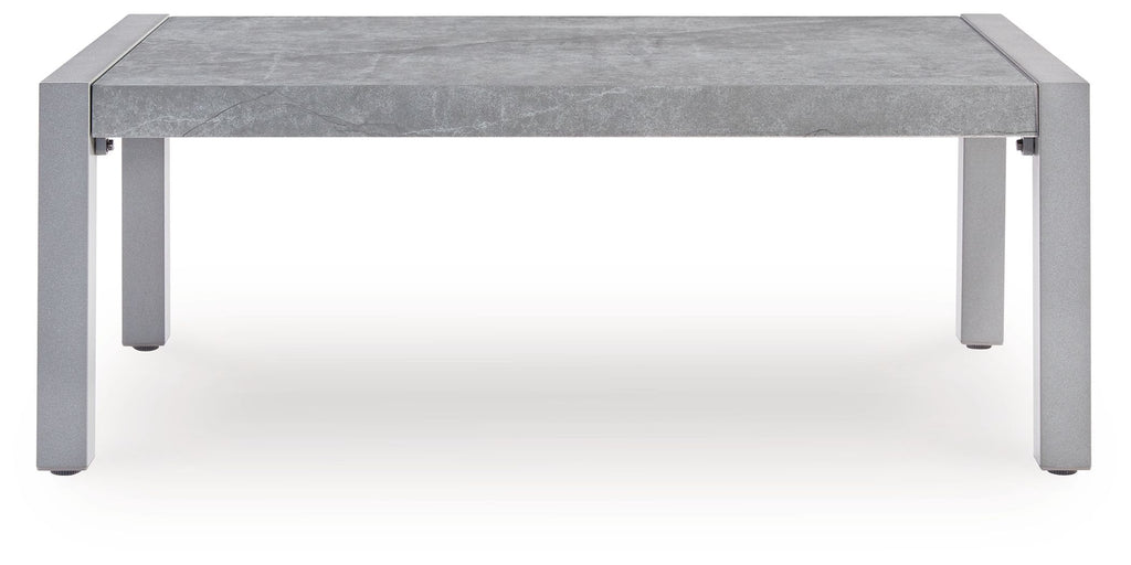 Gray rectangular table with stone-look top and four legs, front view