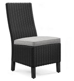 Black woven side chair with light gray cushion seat and curved woven backrest
