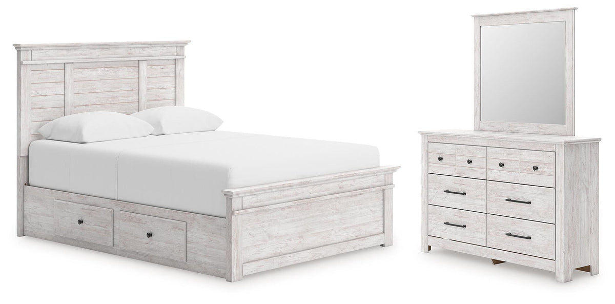 White wood storage bed with drawer front and matching dresser with mirror