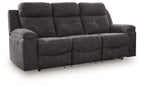 Charcoal reclining sofa with rounded arm and three back sections