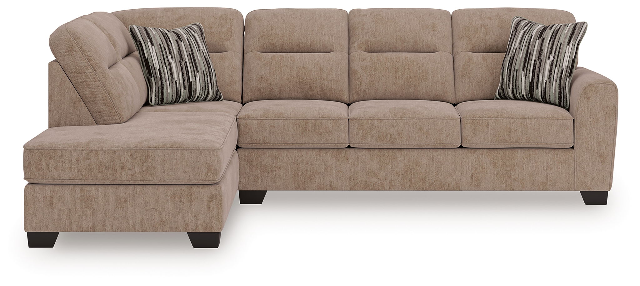 Mocha beige sectional sofa with chaise, tufted seat cushions, and two striped throw pillows