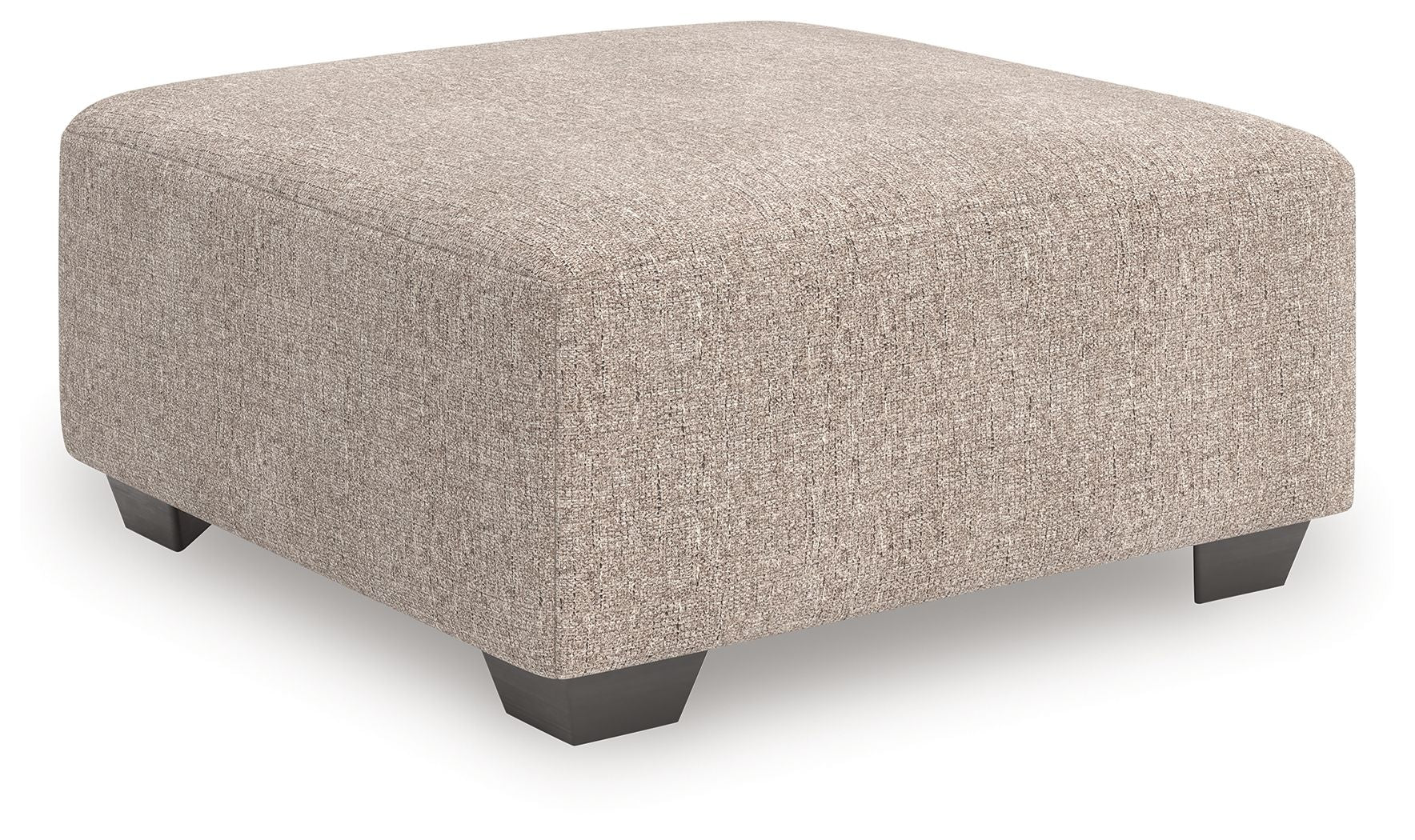 Beige oversized accent ottoman with square padded top and dark legs