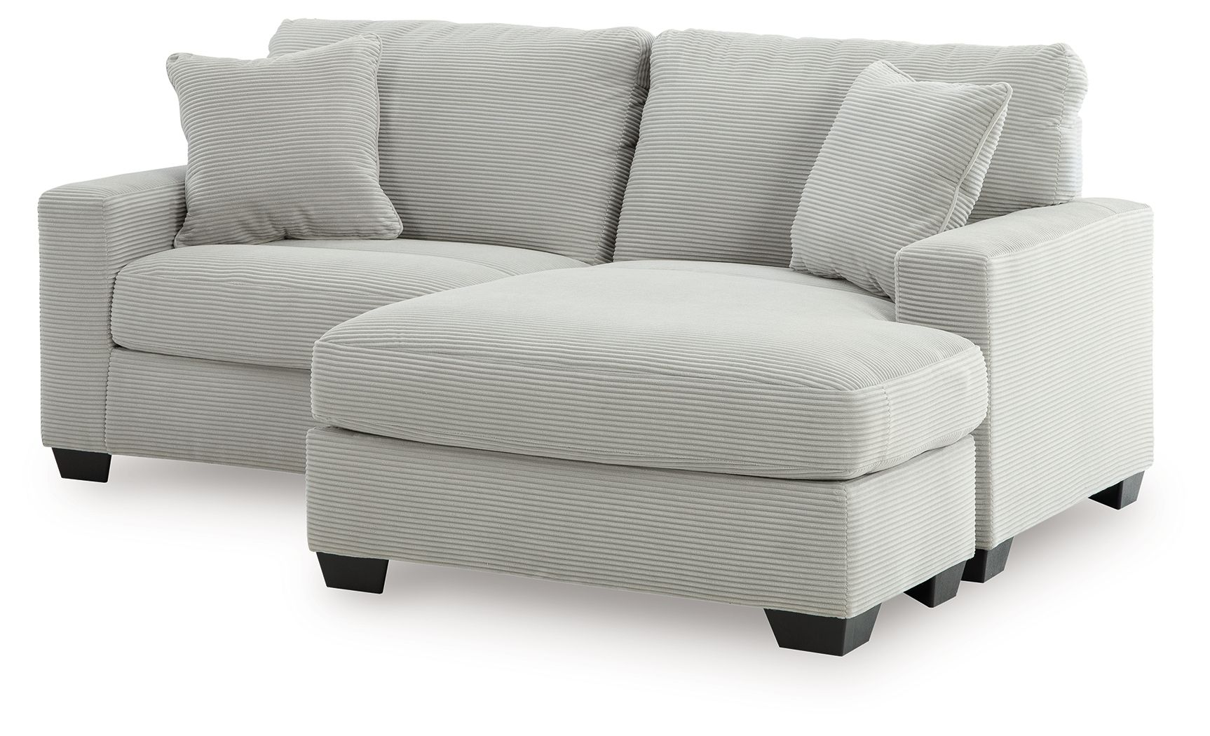 Light gray sofa chaise with rounded chaise ottoman and three back cushions