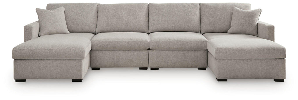 Gray sectional sofa with chaise ottomans and firm, square seat and back cushions