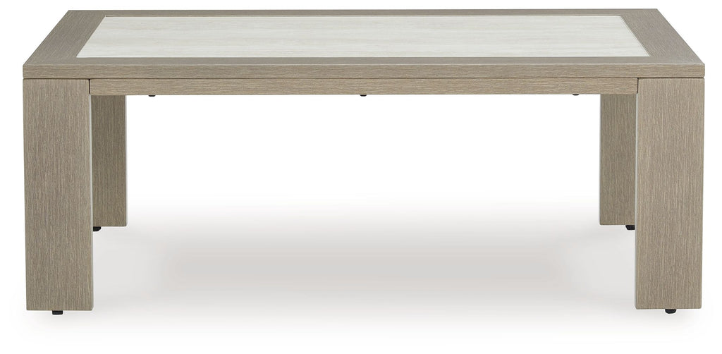 Beige rectangular table with inset light top and corner support legs
