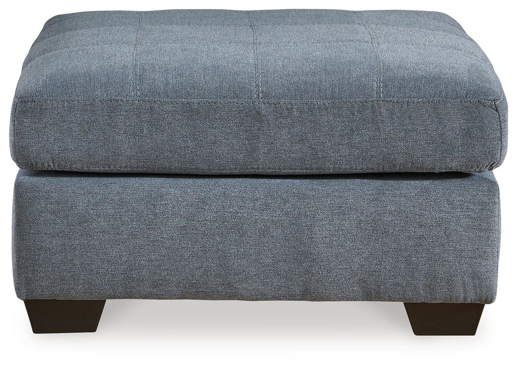 Oversized accent ottoman in dark gray with rounded top and low block legs