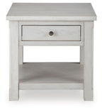 White side table with one drawer, open lower shelf, and centered metal knob.