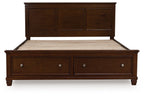 Dark brown panel bed frame with two drawer fronts and paneled headboard