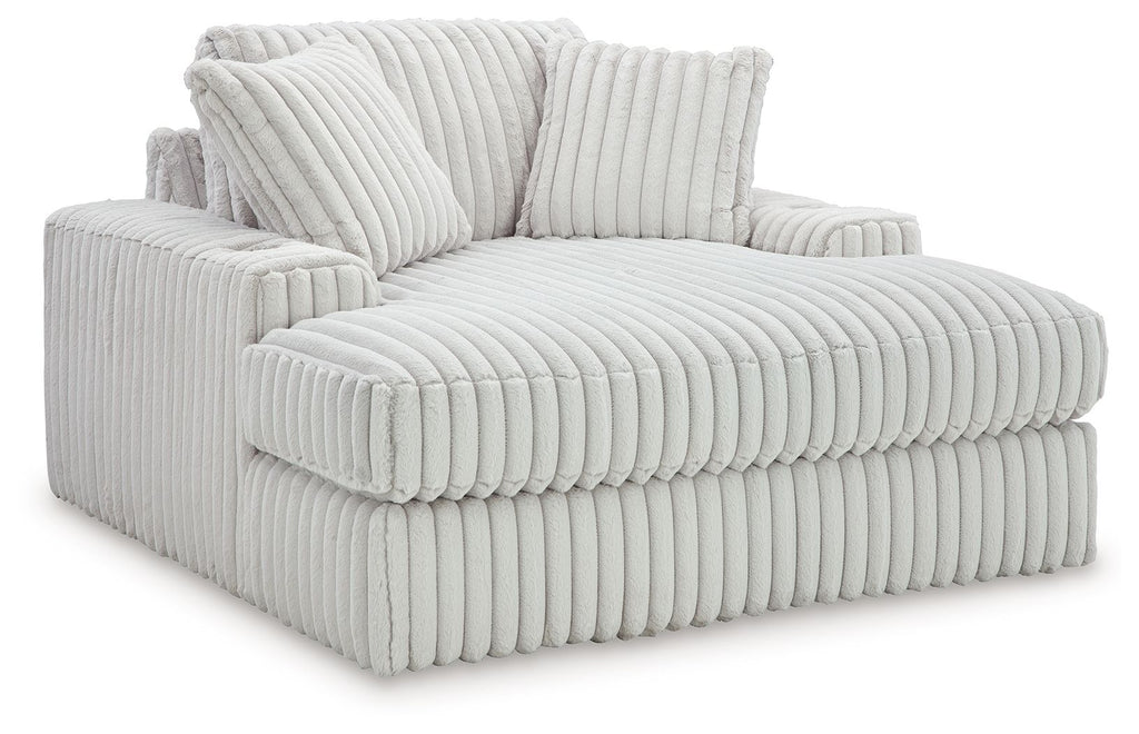 Oversized chaise lounge with ribbed upholstery, two back cushions, light gray