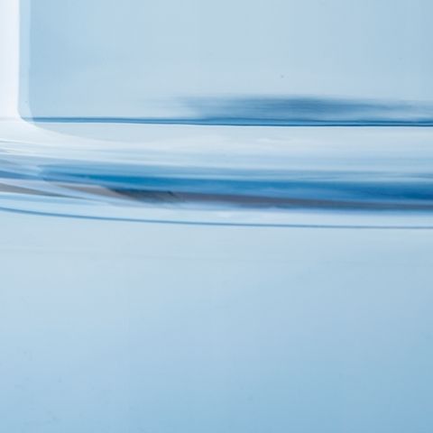 Bealen blue glass vase close-up of thick base rim and glossy surface
