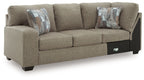 Newellen LAF sofa with corner wedge, beige fabric, three-seat design and throw pillows