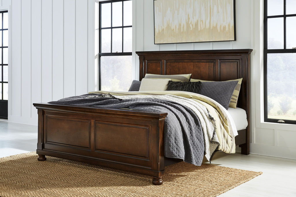 Dark brown panel bed frame with paneled headboard and footboard, linen-covered mattress