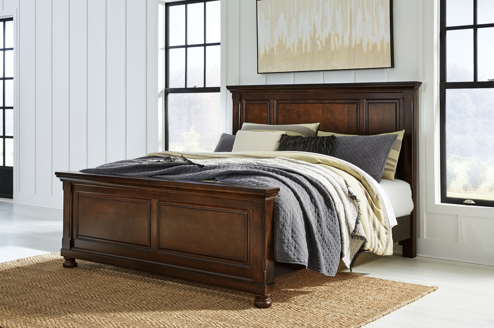 Dark brown panel bed frame with paneled headboard and footboard, linen-covered mattress