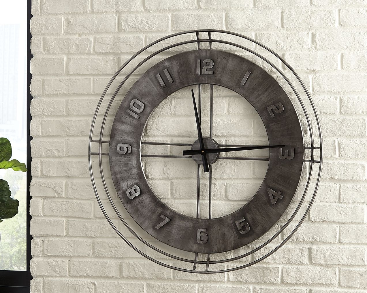 Antique gray wall clock with distressed dial, black hands, Arabic numerals, metal rim