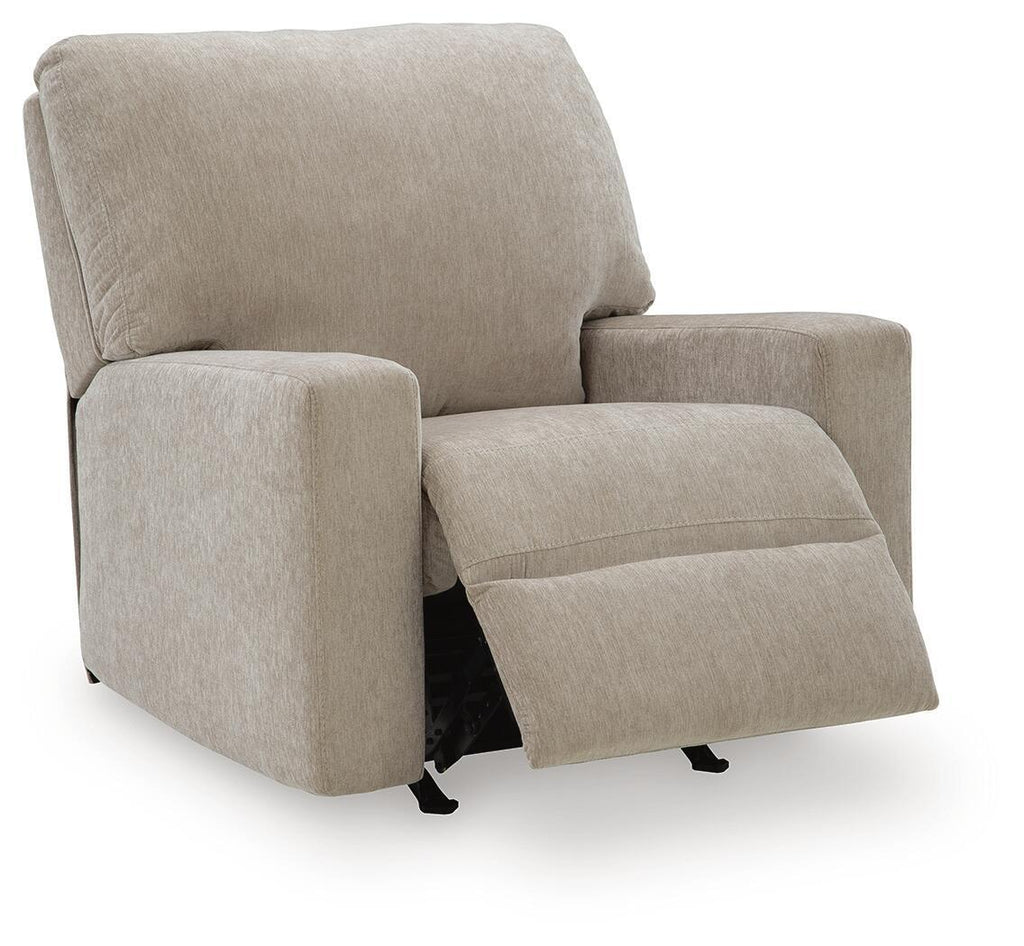 Light gray fabric rocker recliner chair with recline footrest and thick seat padding.